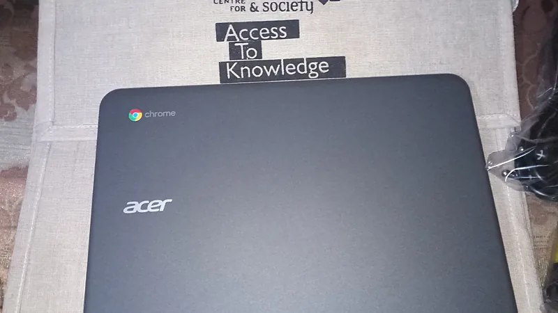Acer Chromebook lid with the Chrome logo resting on a fabric sleeve