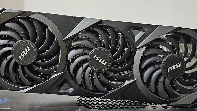 Close-up of an MSI GeForce RTX 3070 Ventus triple-fan graphics card