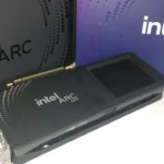 Intel Arc B580 graphics card in front of its retail box