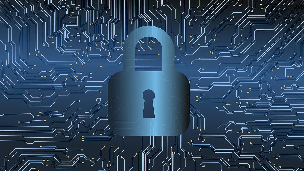 Blue padlock icon over a printed circuit board pattern, illustrating computer security