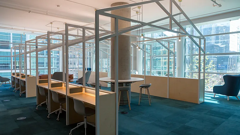 Open-plan office interior with desks and chairs inside Slack headquarters