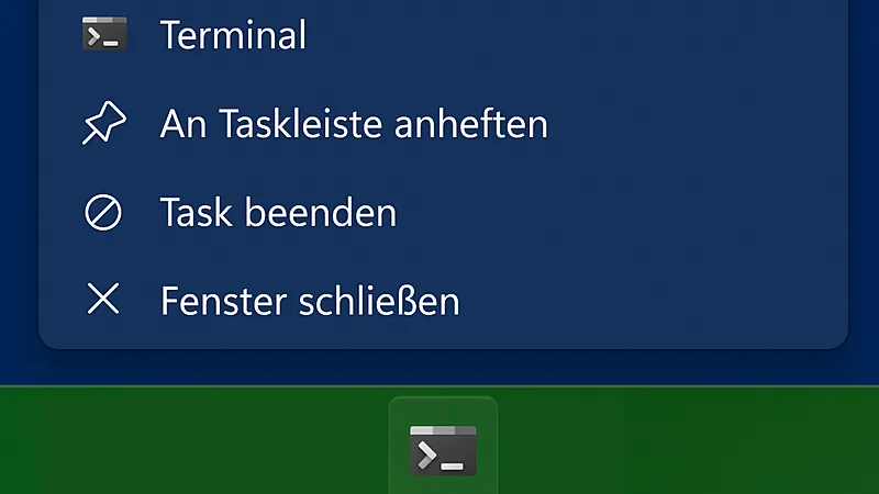 Windows 11 taskbar context menu with End task option, shown in German as Task beenden