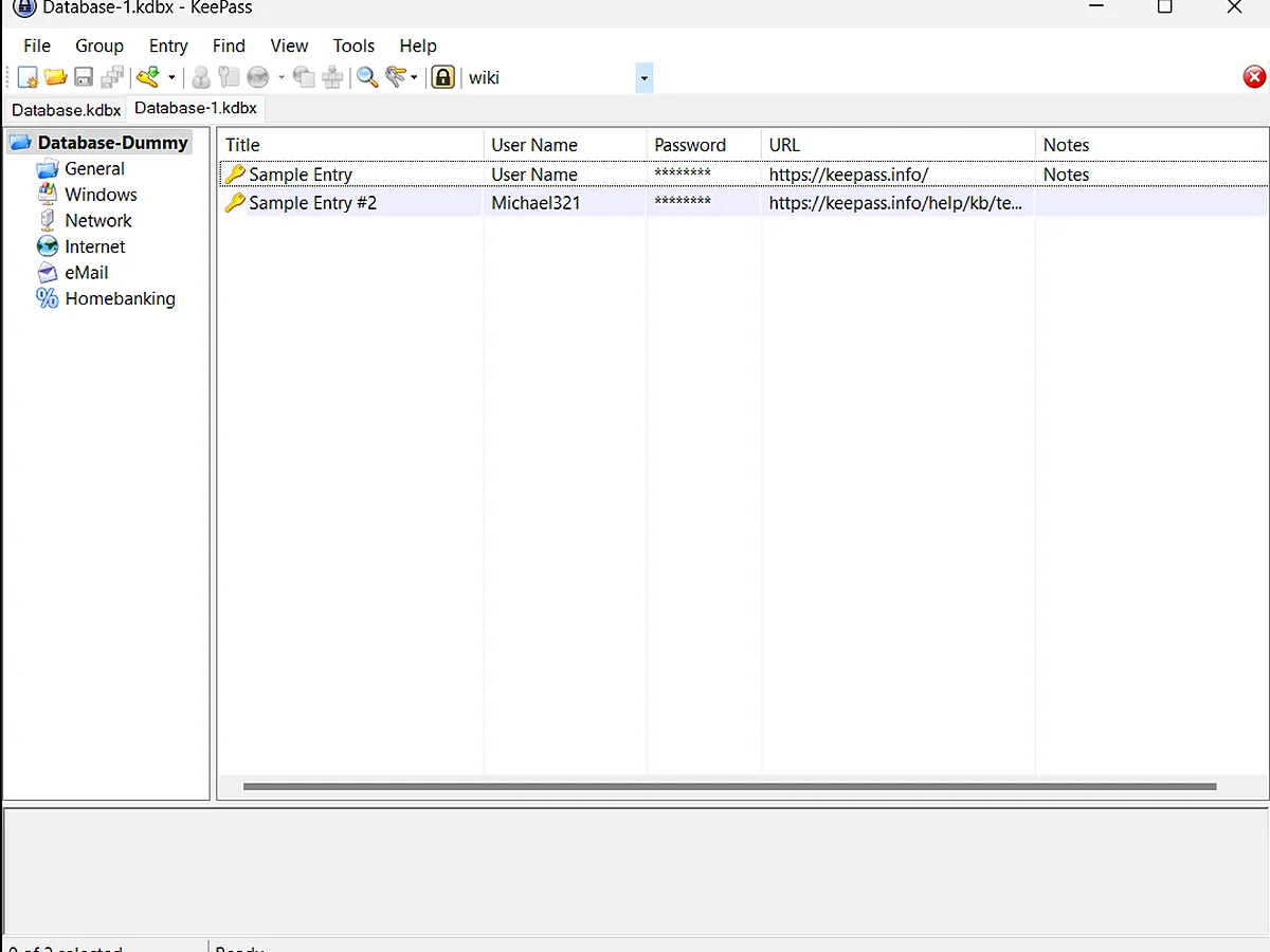 KeePass password manager running on Windows 11, showing a sample database with two entries and category folders.