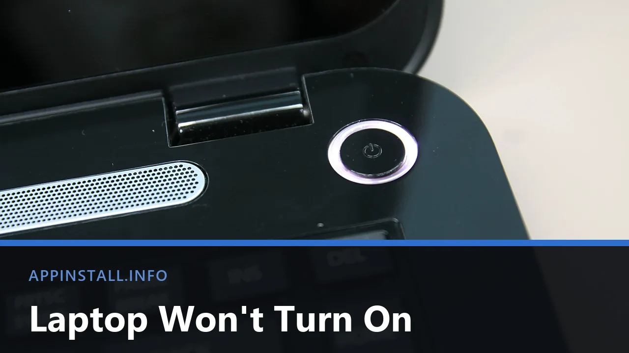 Close-up of the round power button on a black Toshiba laptop, beside the hinge and the speaker grille, with the title Laptop Won't Turn On across the lower part of the image.