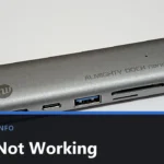 A silver USB-C dock with two USB-C ports, a blue USB-A port and SD card slots, photographed on a plain background, with the title Dock Not Working across the lower part of the image.