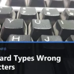 Close-up of the T, Y, U, I, O and G, H, J, K keys on a black keyboard, with the title Keyboard Types Wrong Characters across the lower part of the image.