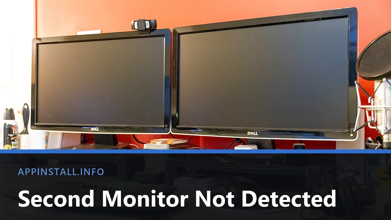 Two dark Dell monitors side by side on a home-office desk, with the title Second Monitor Not Detected across the lower part of the image.
