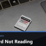 A Samsung PRO Plus 256 GB SD card resting on the palm rest of a laptop beside the keyboard and touchpad, with the title SD Card Not Reading across the lower part of the image.