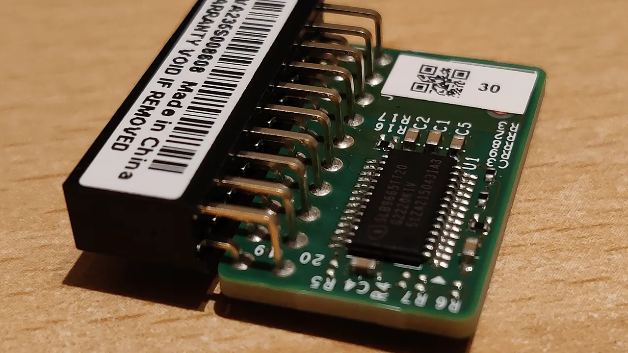 Discrete TPM 2.0 module with an Infineon SLB9665 chip and a 20-pin header