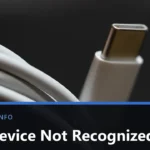 Close-up of a white USB-C cable and connector against a dark background, with the title USB Device Not Recognized across the lower band.